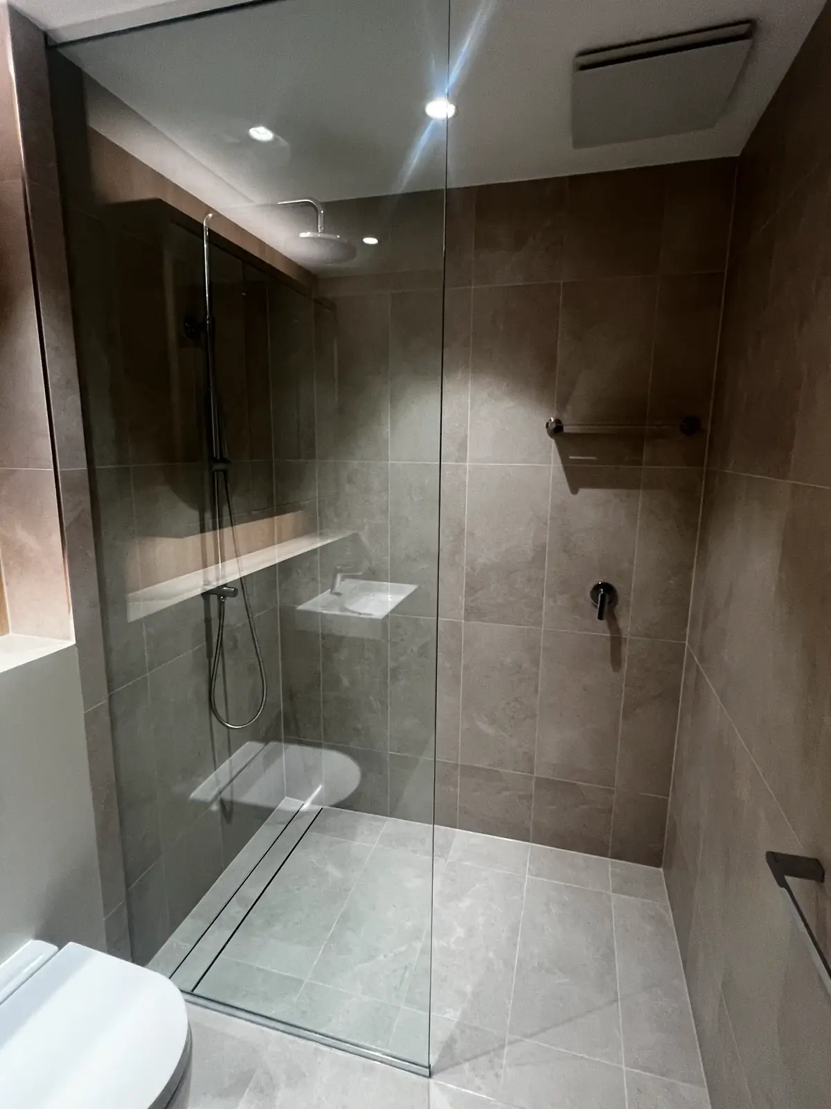 Shower waterproofing repair, Before: Grout & Seal Failure