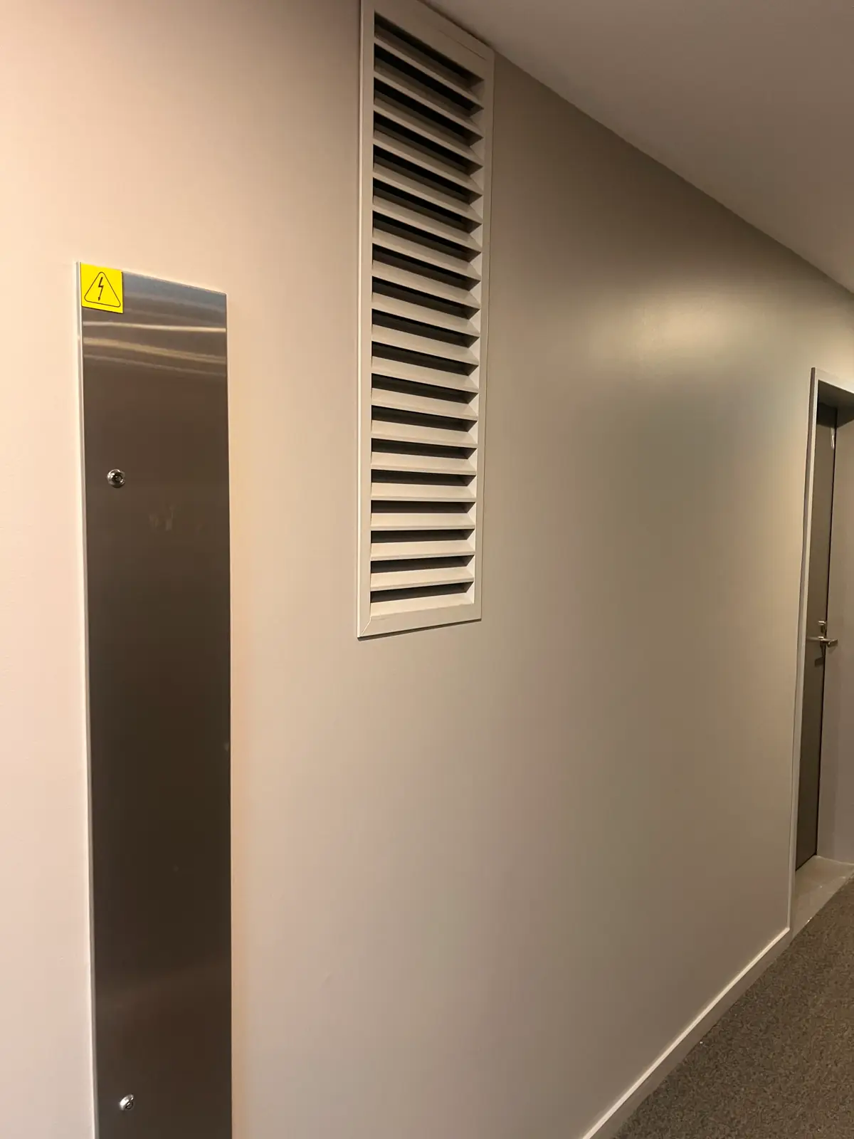 Strata building painting project, Detail: Sharp finish on service walls